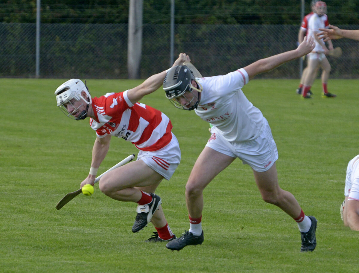 Courcey Rovers' Brendan Ryan (left) in action with Alan McEvoy of Blarney - the two clubs are vying for a place in the Division 3 final along with Ballinhassig. Picture: Denis Boyle