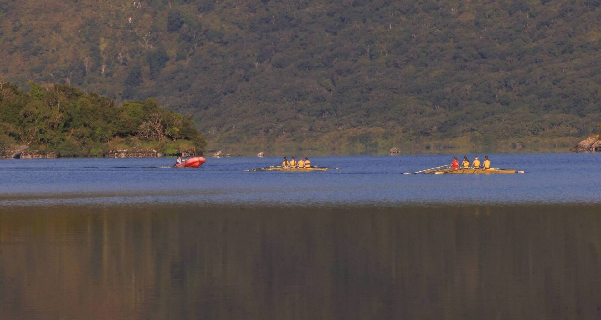 Muckross Rowing Club members take advantage of the calm waters to train on Lough Lein at Killarney National Park. Picture: Valerie O'Sullivan/FREE PIC
