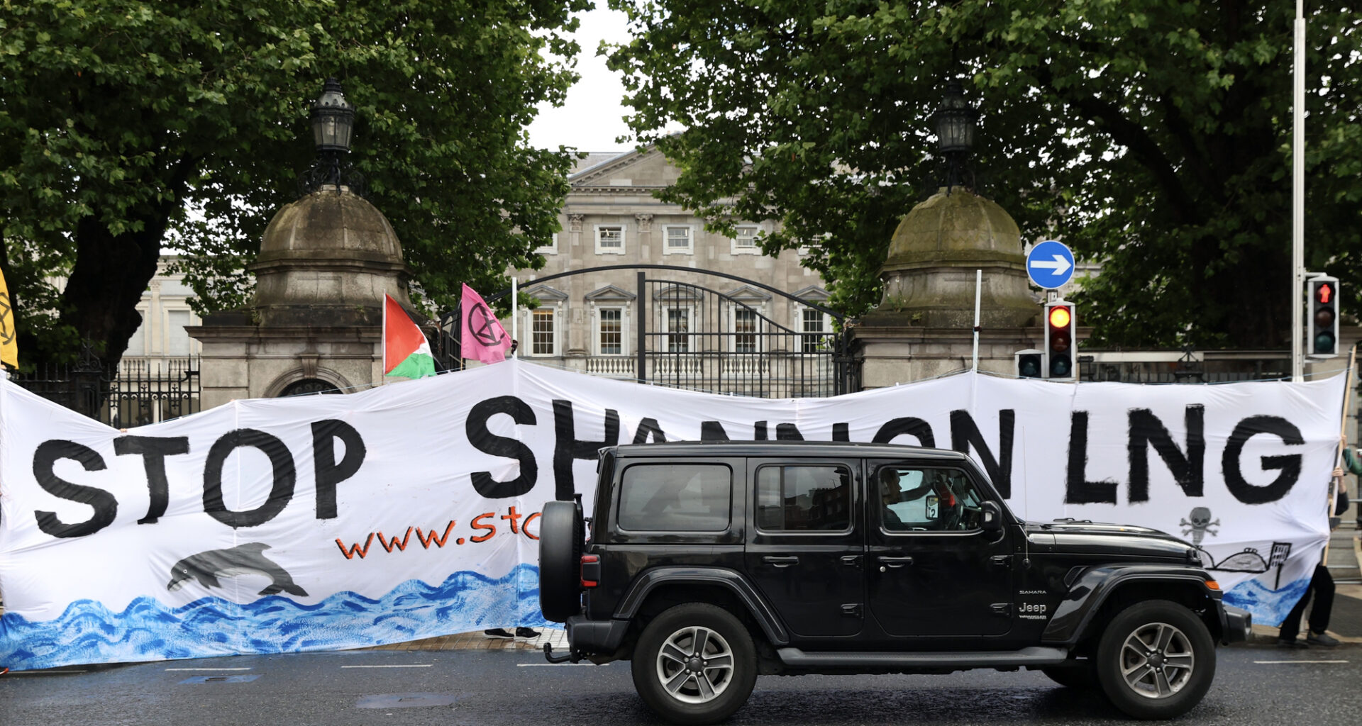 Climate activists from the Stop Shannon LNG Coalition protesting outside Leinster House in July 2025 over government plans to establish liquefied natural gas (LNG) infrastructure in Ireland. File picture: Sasko Lazarov/RollingNews.ie