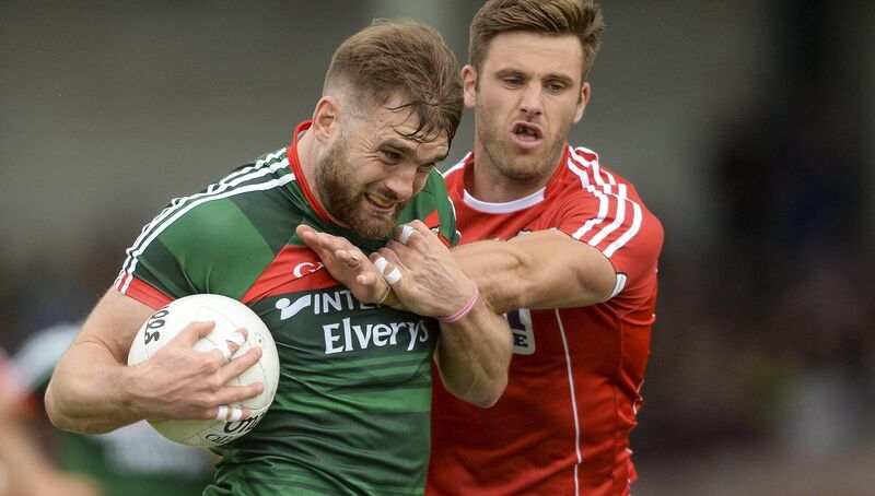 Cork's Eoin Cadogan in action against Aidan O'Shea of Mayo in 2017. Picture: Piaras Ó Mídheach/Sportsfile
