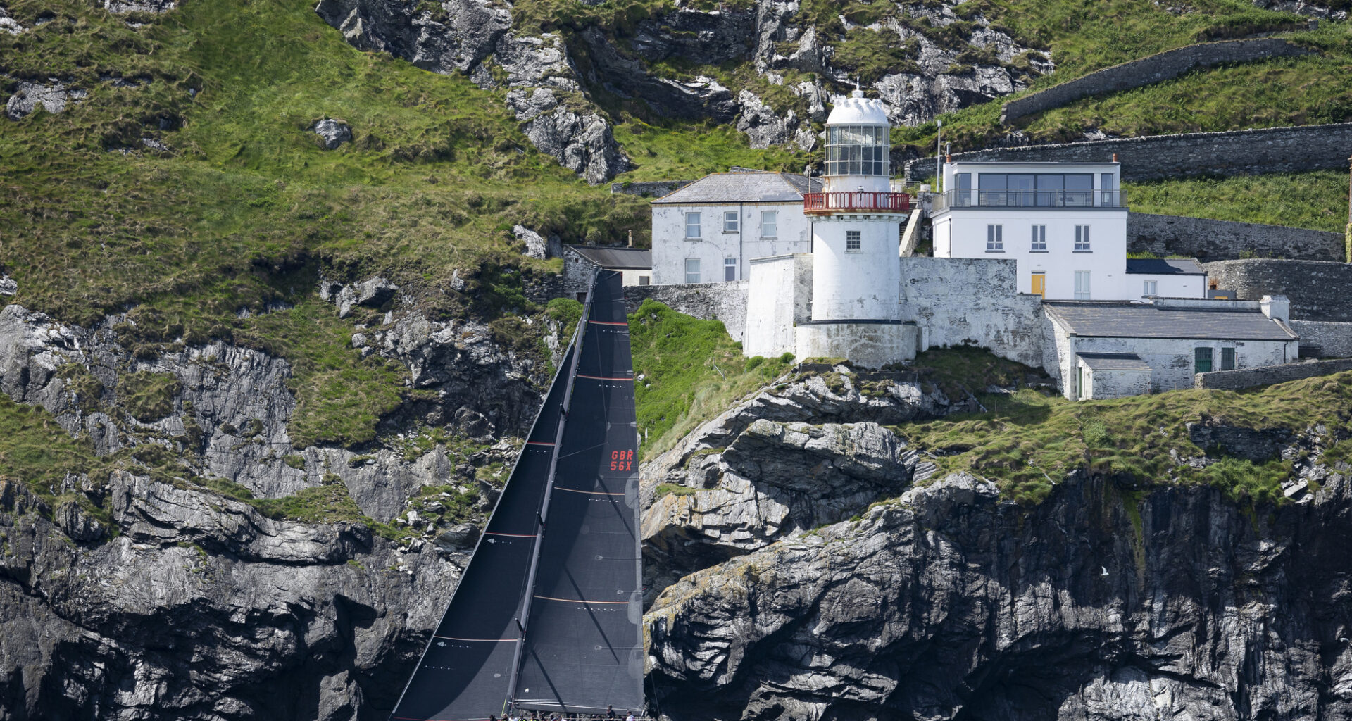 Class 0 entry starting the 704 nautical mile Round Ireland Race is Khumbu skippered by Guy Gillon passes Wicklow Head lighthouse. Photograph: David Branigan/Oceansport Repro free for editorial use with credit byline