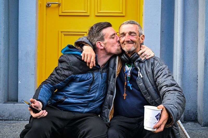 Darren Delaney and his father Tommy Matthews share a moment outside the Lighthouse centre.