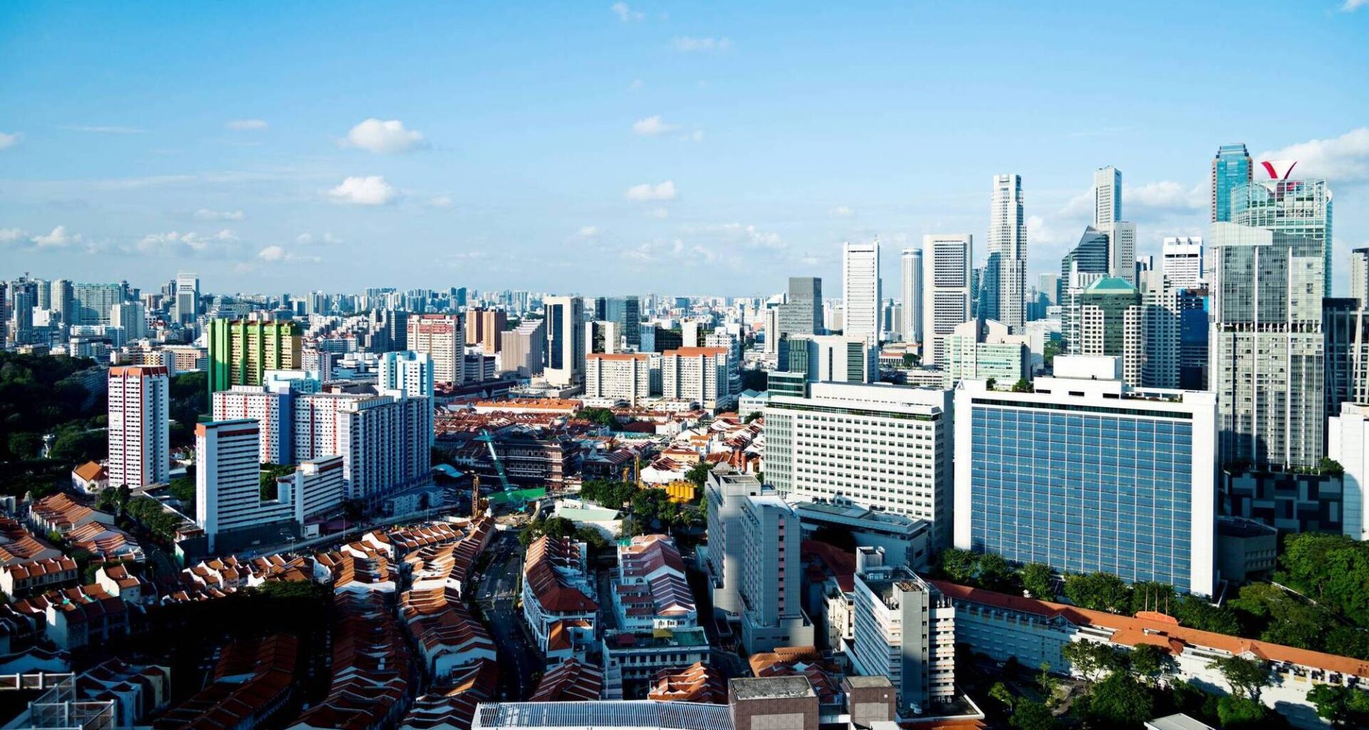 Singapore’s signature public housing is high-rise apartments of up to 50 stories, but many of the structures are softened by green skyways and vertical gardens. File picture