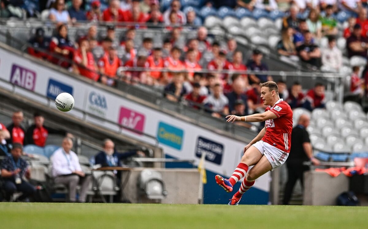 Steven Sherlock of Cork kicks a 45 against Mayo. Picture: Ben McShane/Sportsfile