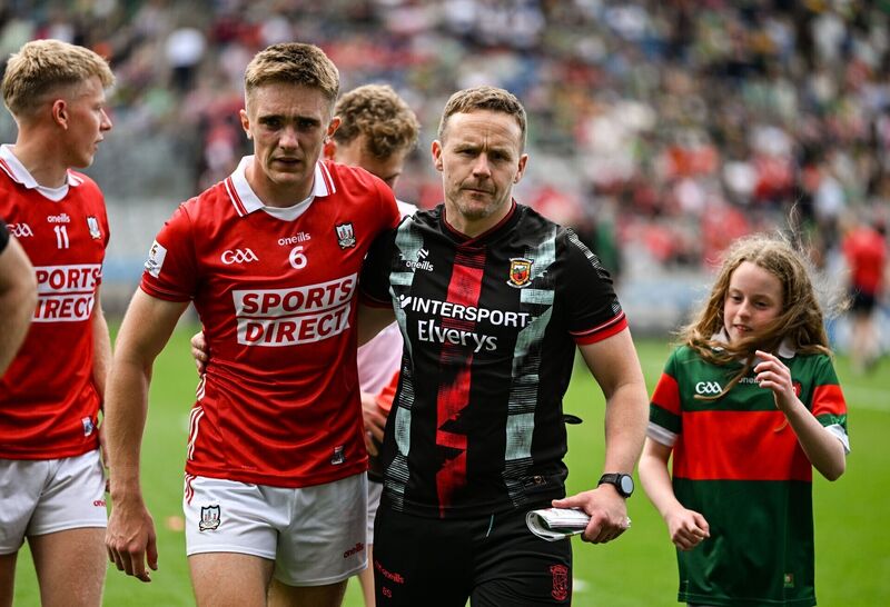 Mayo manager Andy Moran consoles Tommy Walsh of Cork after the GAA Football All-Ireland Senior Championship quarter-final match between Cork and Mayo at Croke Park in Dublin. Photo by Ray McManus/Sportsfile