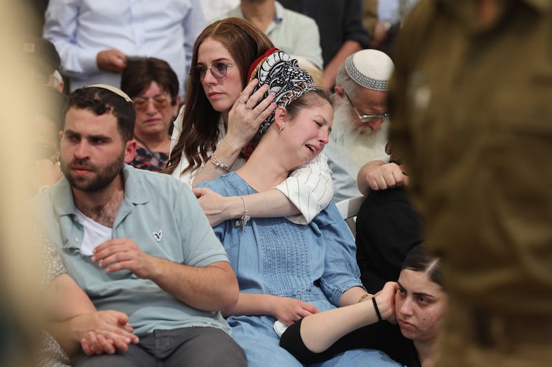 Family members mourn during the funeral ceremony of Israeli soldier Sgt Ohad Yaari in Rehovot, Israel, on Sunday. Israel's military announced on Saturday that two soldiers were killed in separate incidents in southern Lebanon. Photograph: Abir Sultan/EPA