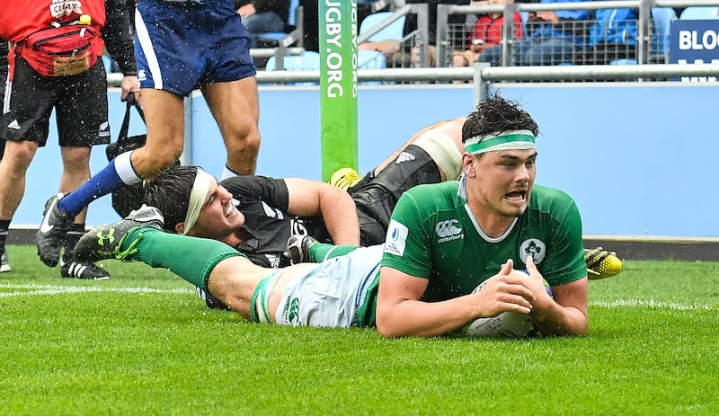 Max Deegan goes over for Ireland's third try against New Zealand. Photograph: Dave Howarth/INPHO
