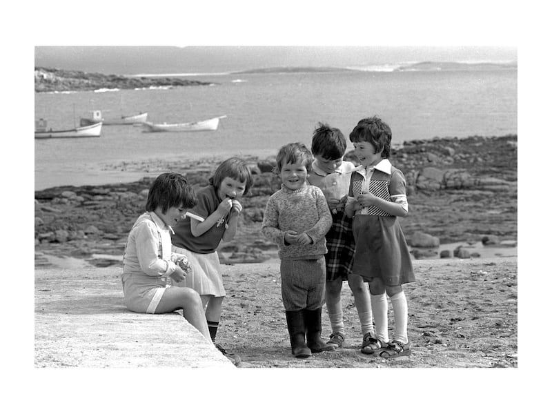 Maighread Nic Ruaidhraidh with Frances, Gerry, Jeanette and Tina Rodgers on Tory Island in 1977. Photograph: Eric Luke