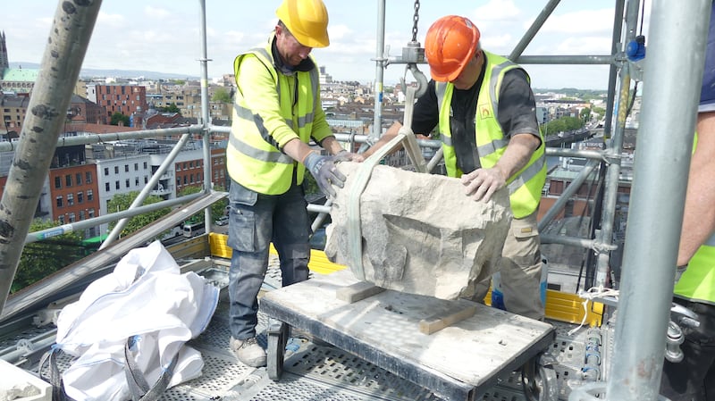 Four Courts restoration: a damaged capital is removed. Photograph: OPW