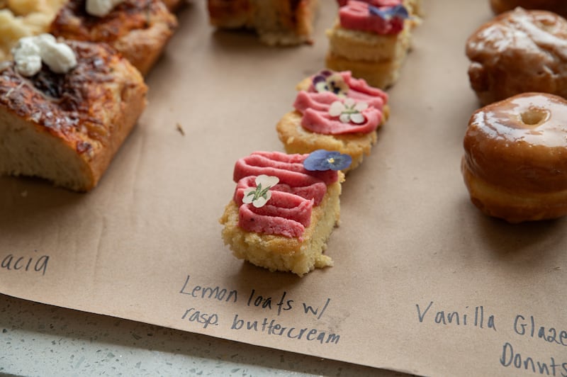 Aulbright Nyih's baked goods, neatly arranged and labelled. Photo: Natalia Campos/ The Irish Times