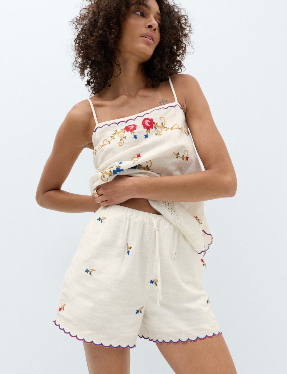 Casual outfit featuring embroidered top and shorts casual outfit featuring embroidered top and shorts