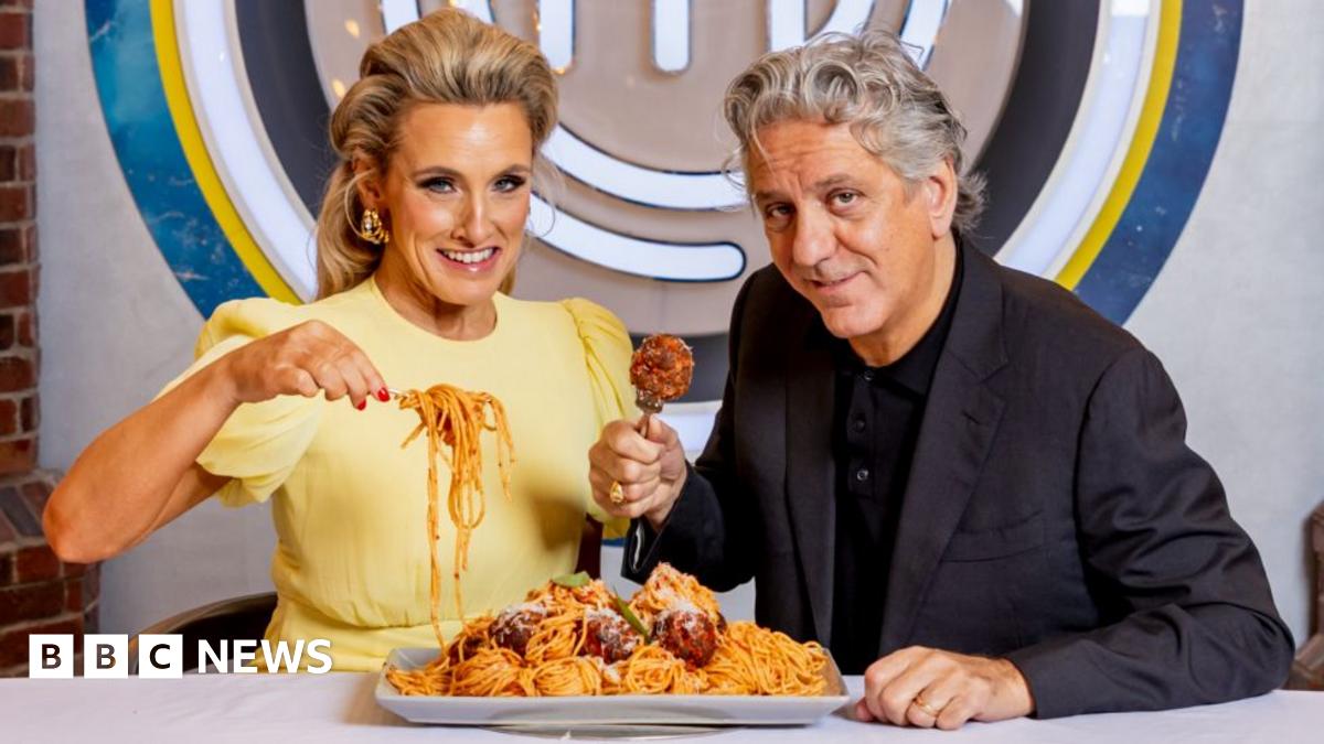 Grace Dent and Giorgio Locatelli pictured with a plate of spaghetti meatballs and the MasterChef logo in bbthe background