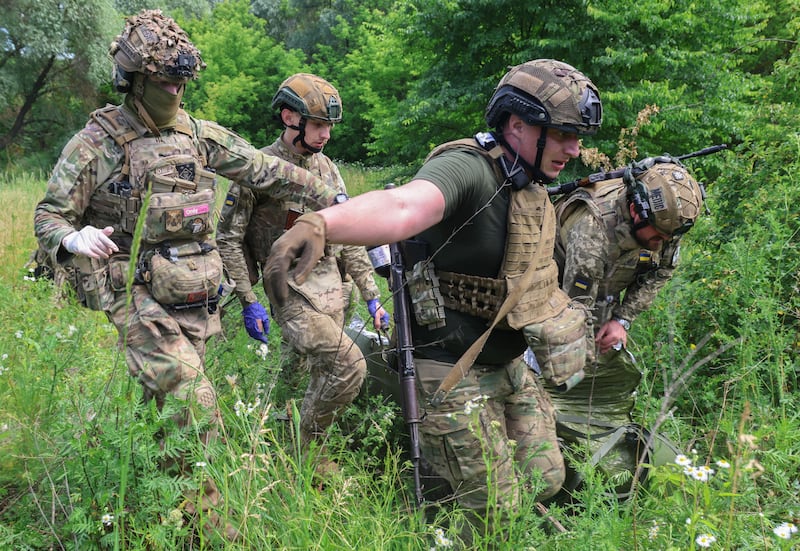 Border guards attend medical training before departure to the frontline in the Kharkiv region, Ukraine. Photograph: EPA