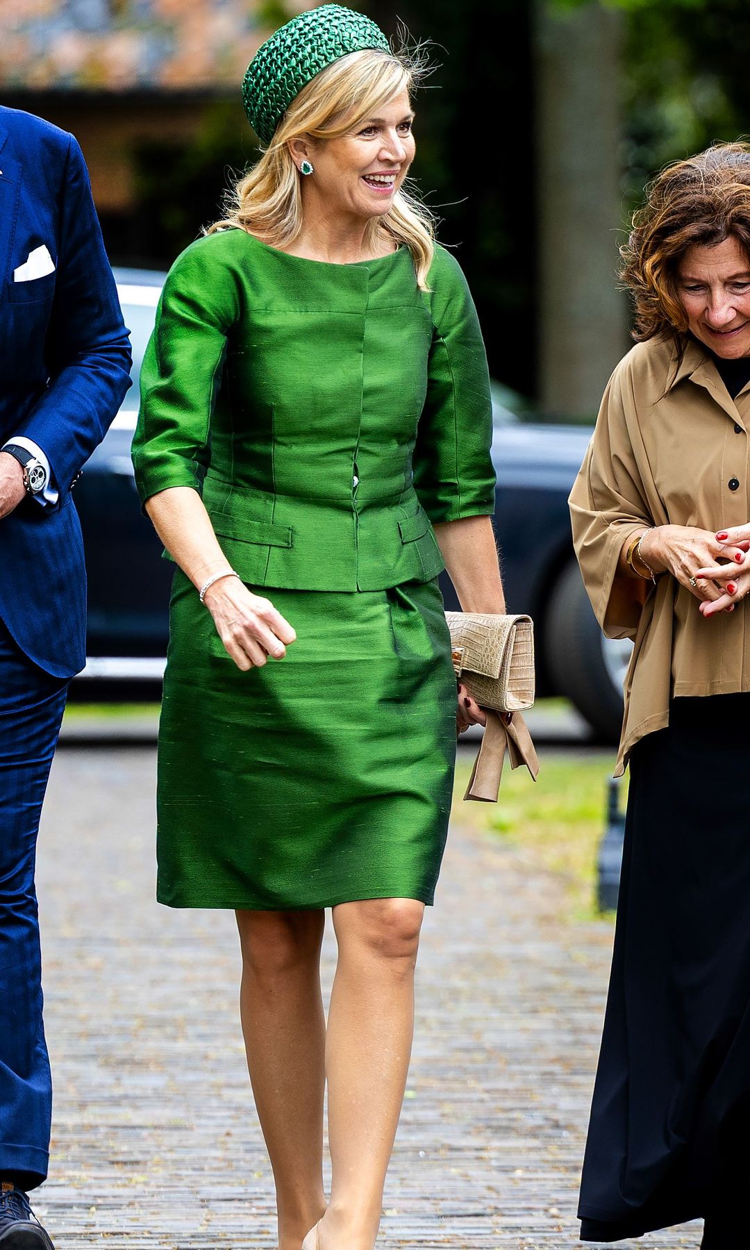 Queen Maxima wore an emerald green skirt suit