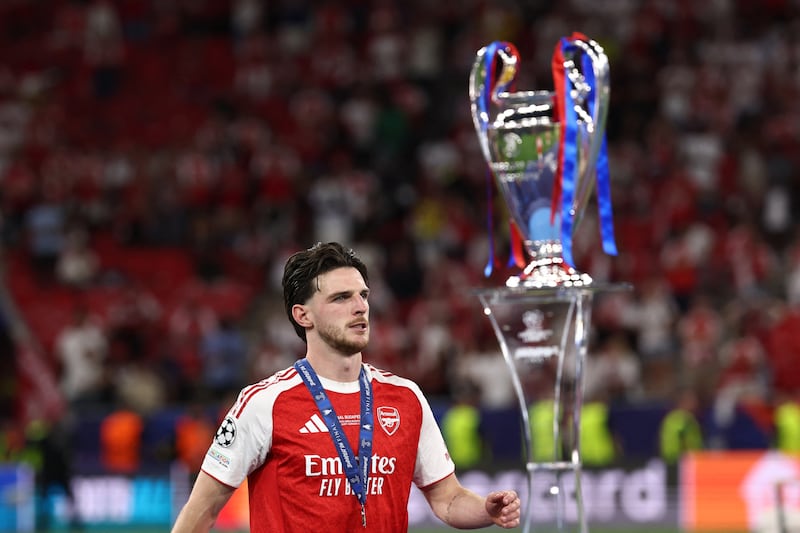 Declan Rice walks past the Champions League trophy after Arsenal's defeat to PSG. Photograph: Franck Fife/AFP via Getty Images