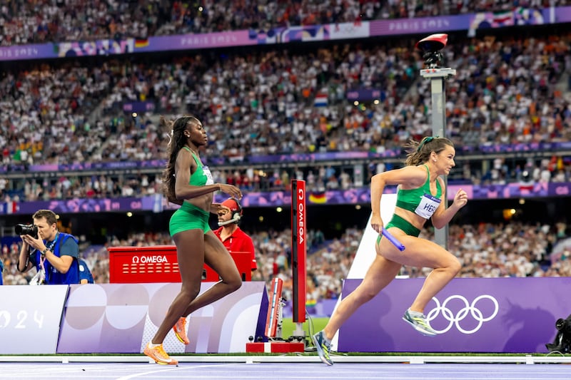 Phil Healy takes the baton from Rhasidat Adeleke in the final of the women’s 4x400m relay at the Paris Olympics. Photograph: Morgan Treacy/Inpho