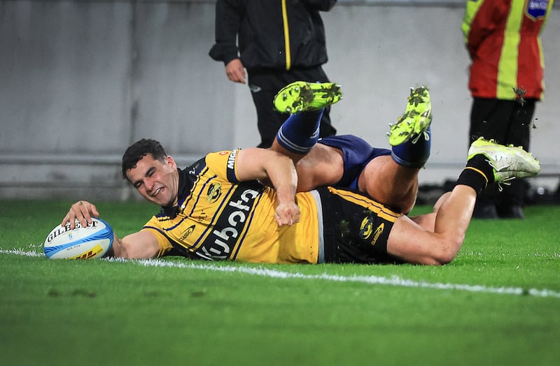 Josh Moorby of the Hurricanes dives in to score a try during the Super Rugby Pacific semi-final match between the Wellington Hurricanes and Auckland Blues. Photograph: Grant Down/AFP via Getty Images