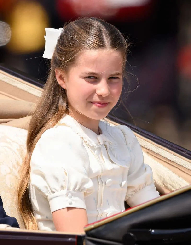 Princess Charlotte in a white dress in a carriage during Trooping The Colour 2026