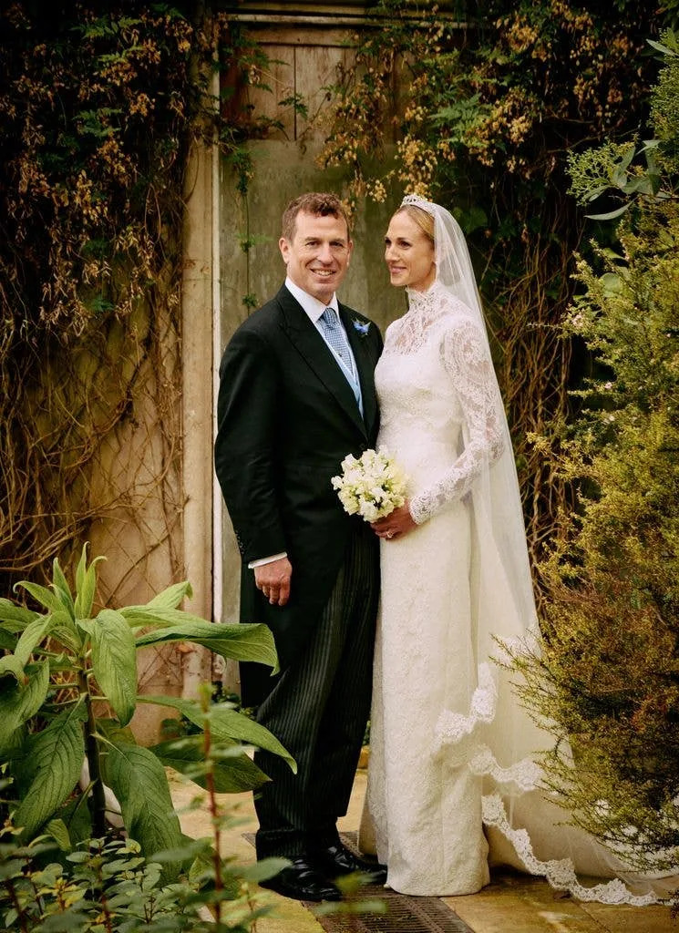 Harriet and Peter in the conservatory at Gatcombe Park for their official wedding portrait
