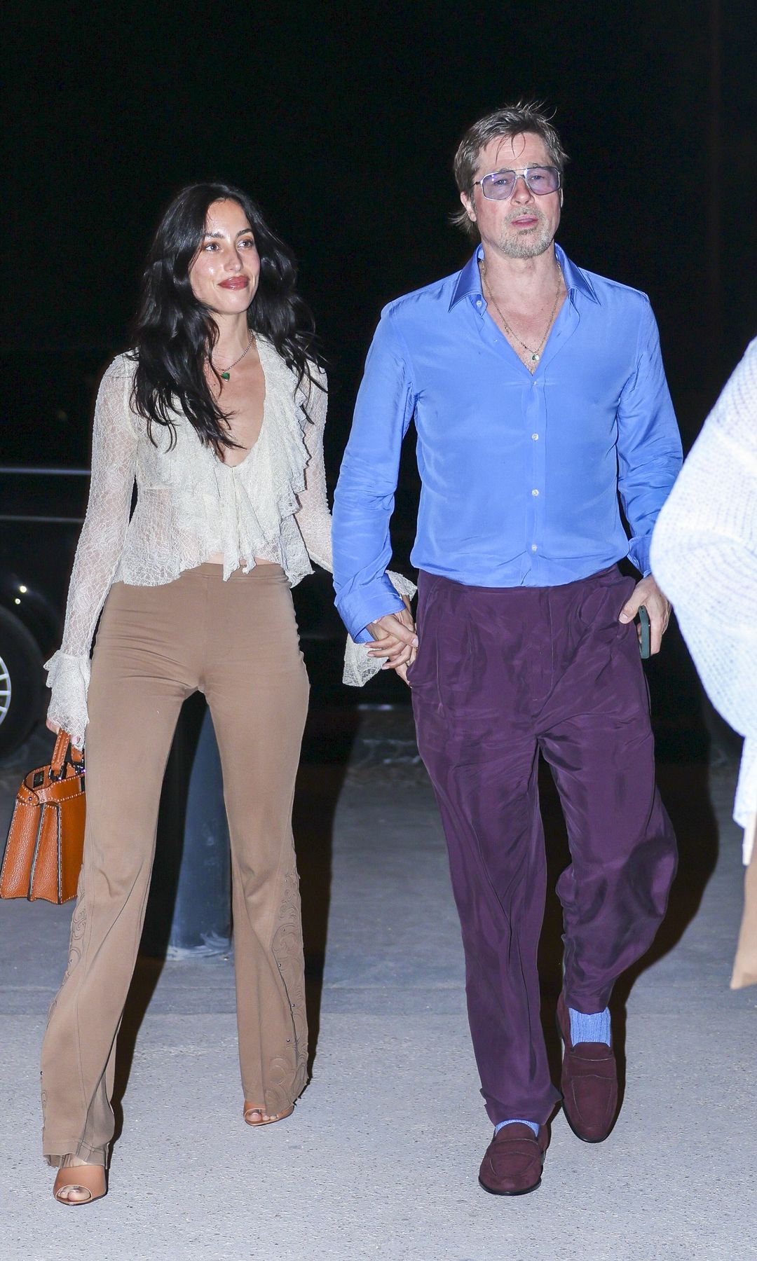 The pair wore striking and colorful outfits for the occasion