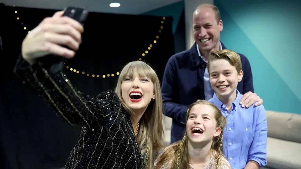 Taylor Swift taking a selfie with Prince William, Princess Charlotte and Prince George