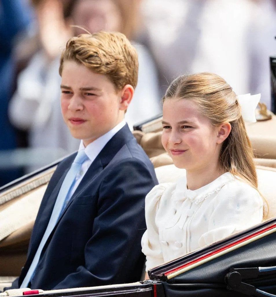 Prince George of Wales and Princess Charlotte of Wales travel by carriage