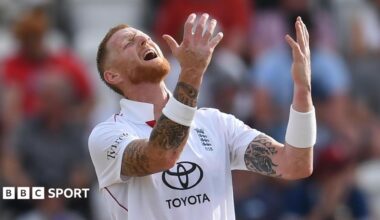 England opener Ben Duckett kisses the badge on his helmet after hitting a century