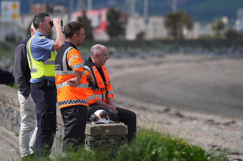 Members of the Coast Guard and a Garda during the rescue operation. Photograph: Niall Carson/PA Wire