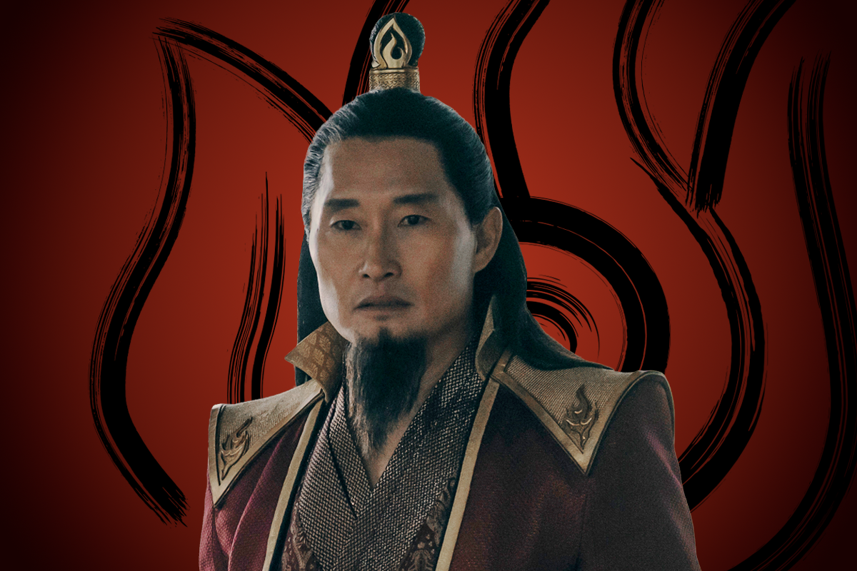 Daniel Dae Kim as Fire Lord Ozai in ornate red and gold armor stands in front of a stylized flame symbol on a dark red background, evoking a regal or authoritative presence in a fantasy or historical setting.