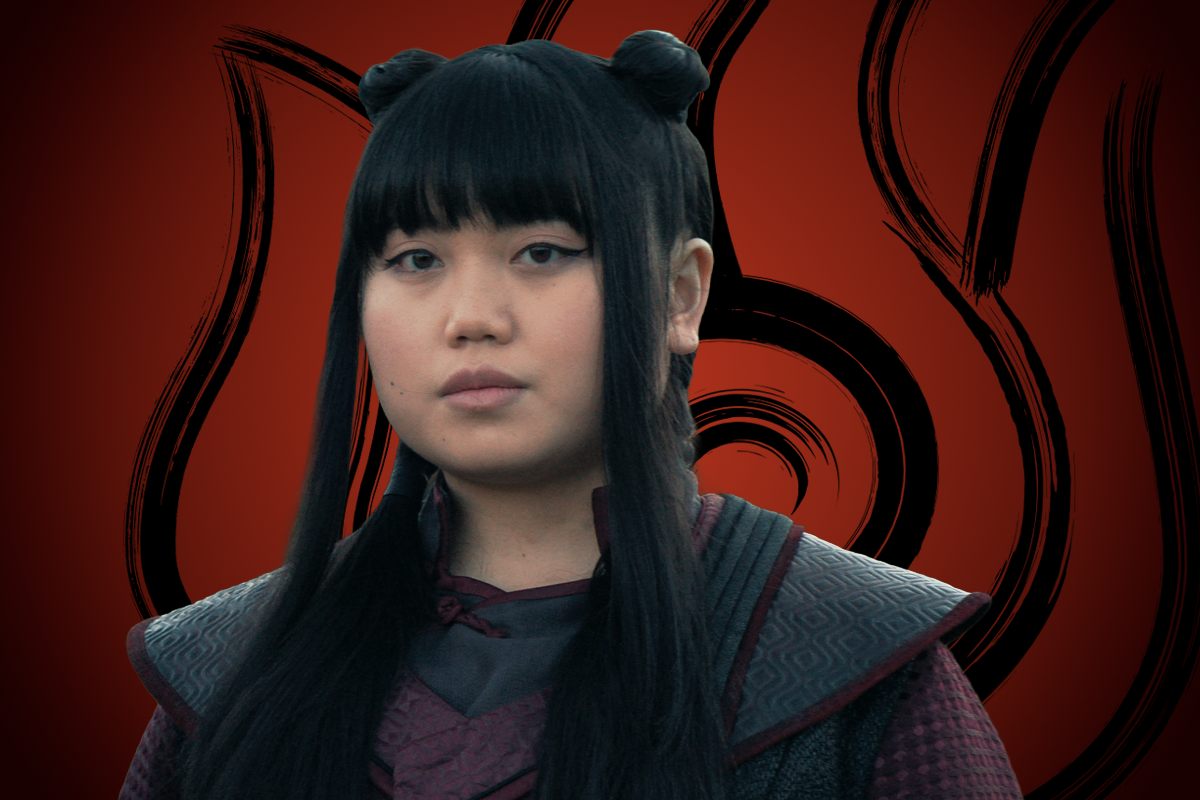 Momona Tamada as Ty Lee with straight black hair in a dark costume stands against a stylized red and black background featuring swirling flame patterns.