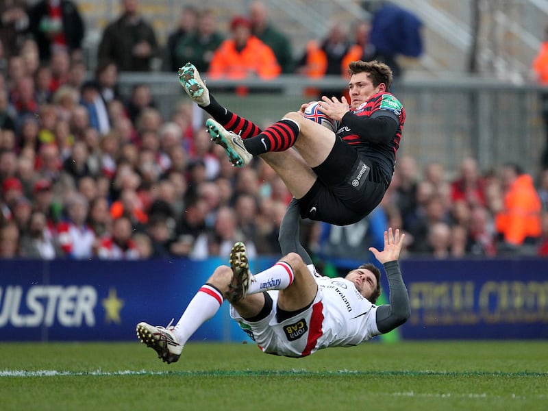 Ulster's Jared Payne tackles Alex Goode of Saracens in a 2014 Heineken Cup quarter-final. Photograph: Brian Little/Inpho/Presseye