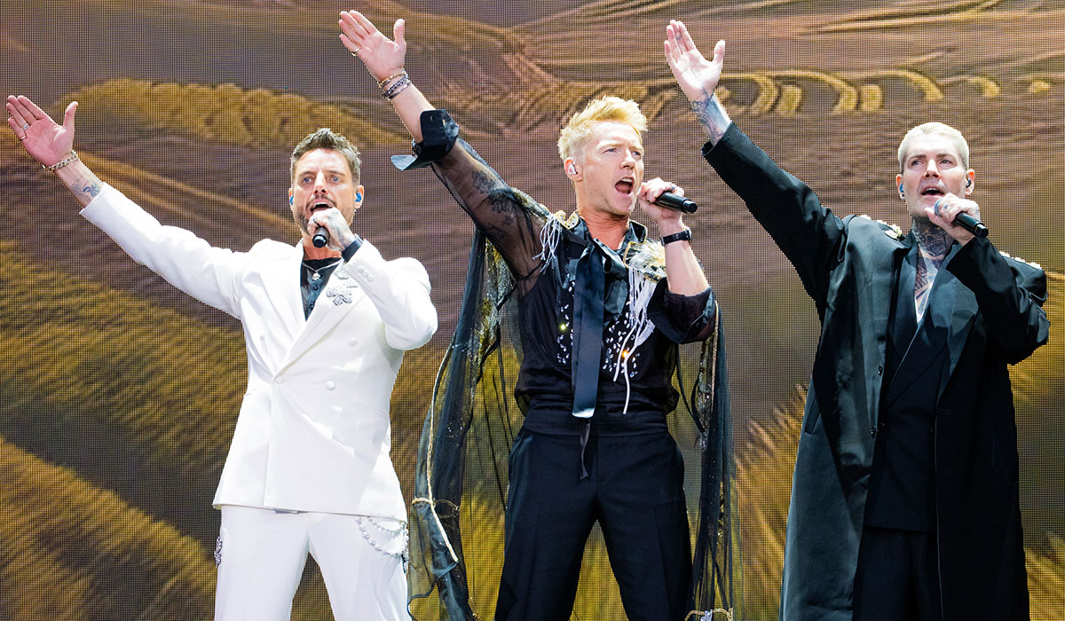 Keith Duffy, Ronan Keating and Shane Lynch of Boyzone performing at the Emirates Stadium in London. Pic: James Klug/Getty Images