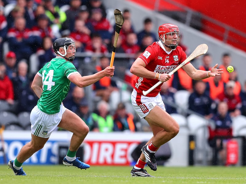 Cork's Brian Hayes with Aidan O'Connor of Limerick during the Munster hurling final. Photograph: Tom O’Hanlon/Inpho