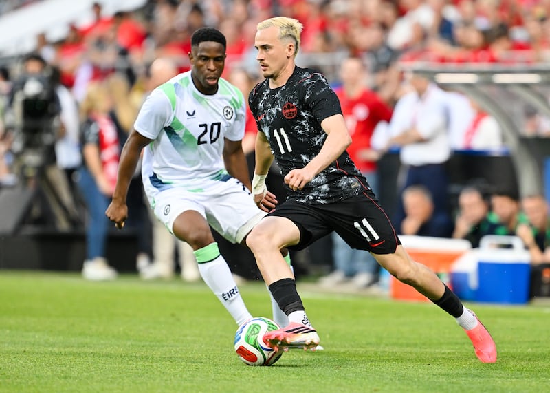 Liam Millar in action against Chiedozie Ogbene in the first half. Photograph: Minas Panagiotakis/Getty Images