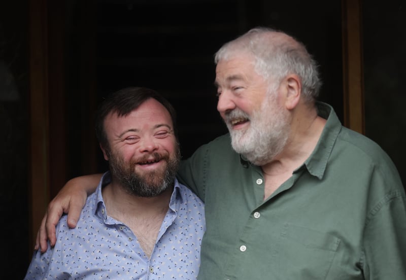Ivan Martin and his son James speaks to The Irish News.
PICTURES: COLM LENAGHAN