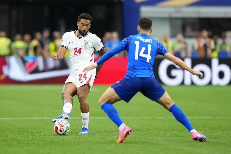 England's Reece James in action against Croatia's Ivan Perisic during the Group L match. Photograph: Nick Potts/PA Wire
