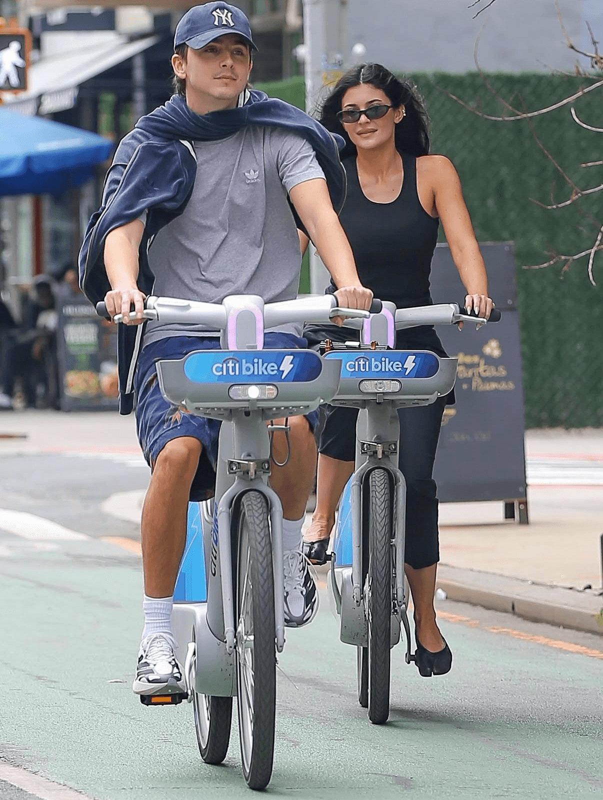 Image may contain Timothe Chalamet Kylie Jenner Bicycle Cycling Person Sport Transportation Vehicle and Escooter