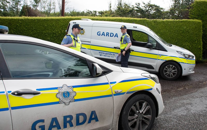 Gardaí at the scene at Ardsallagh, Co Waterford, where Noreen Daly was found dead. Photograph: Provision
