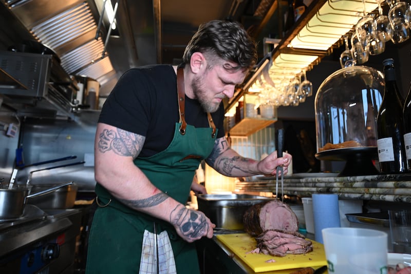 Honza Margold preparing the Sunday roast. Photograph: Bryan Meade