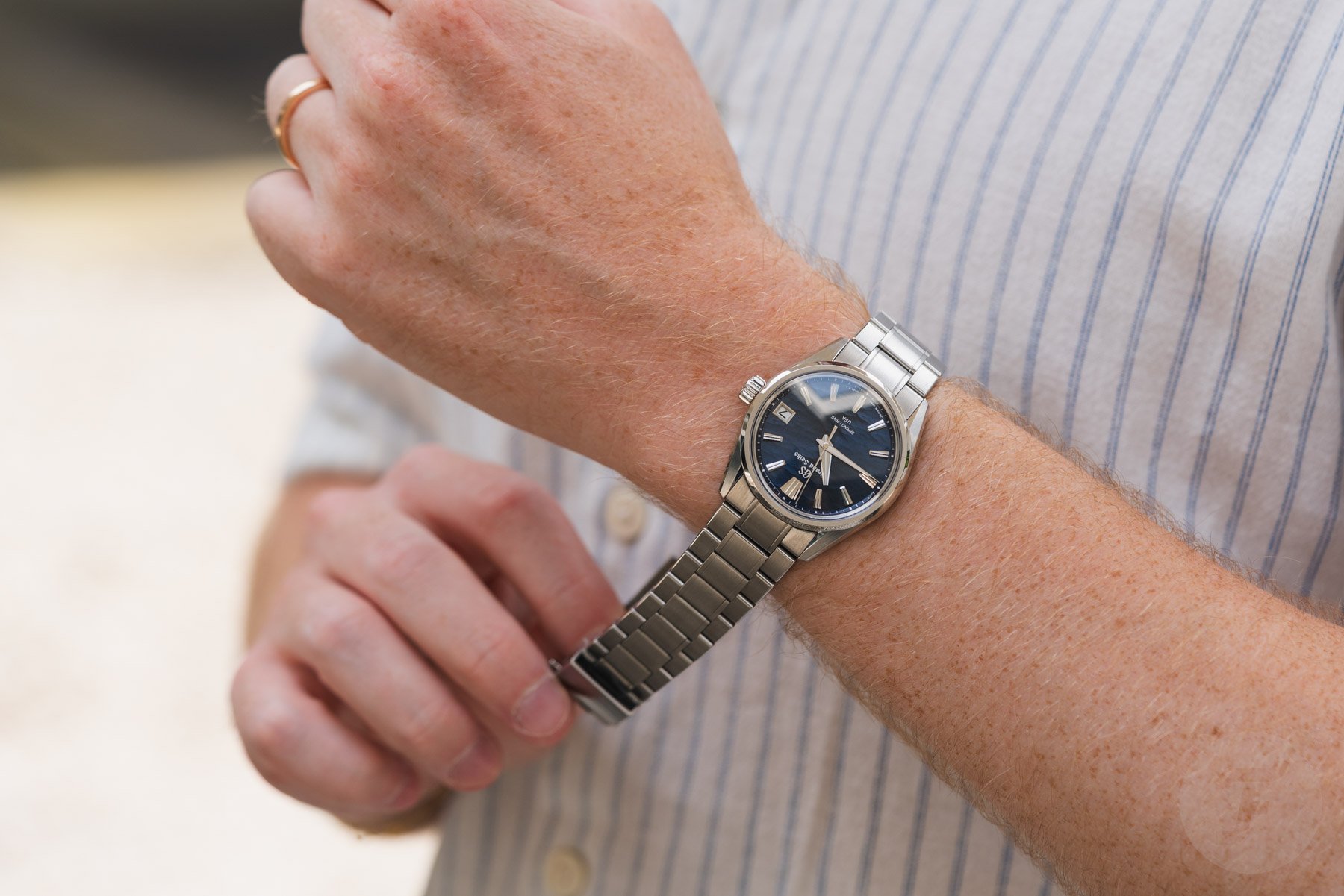 putting Grand Seiko Evolution 9 Spring Drive U.F.A. SLGB015 on wrist
