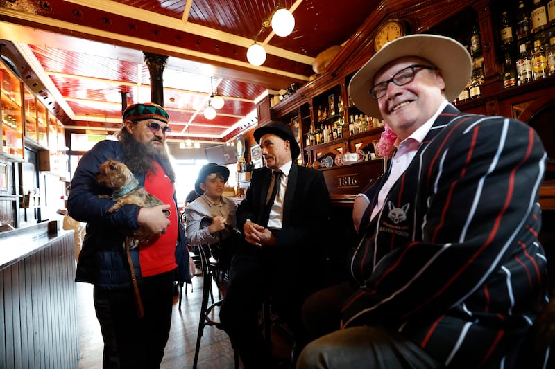 Jasper Kearns and 'Milly', Macdara Boyd with Stephen Boyd and Johnny Bell in Ringsend for Bloomsday. Photograph: Nick Bradshaw/ The Irish Times