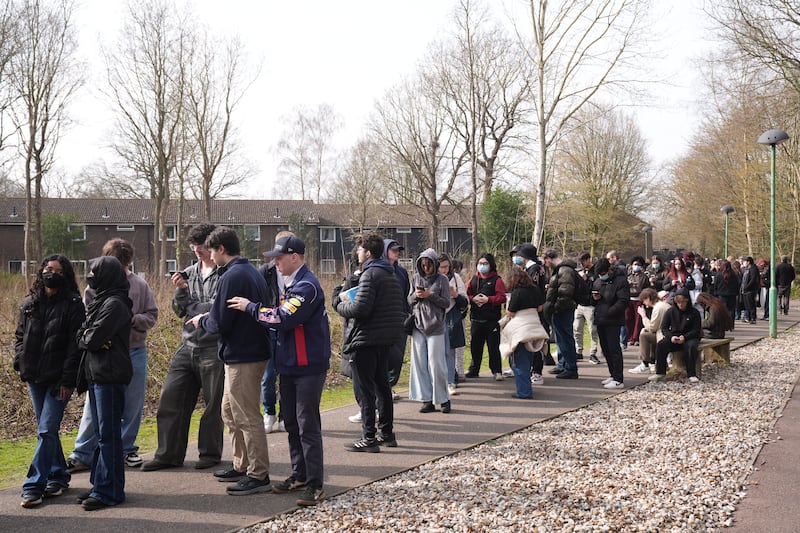 Students queuing to receive vaccines and antibiotics at the University of Kent campus in Canterbury on Saturday morning