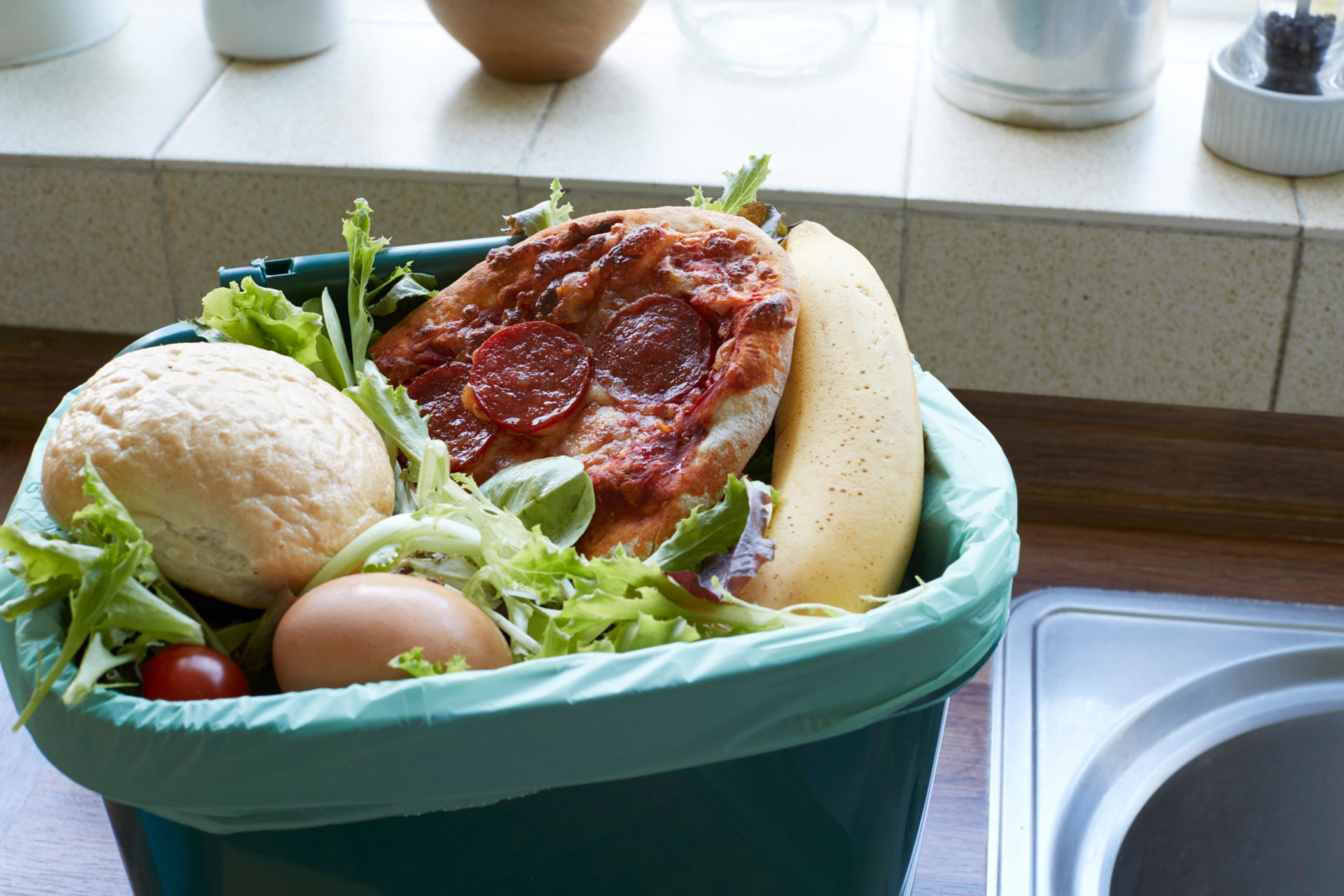 Food waste in a recycling bin at home, 16-9-17