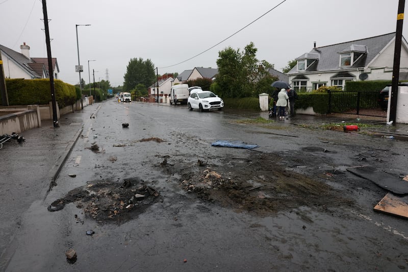 Debris on the road after a night of violent disorder on Antrim Road in Newtownabbey, Northern Ireland, on Thursday. Photograph: Adam Vaughan/EPA