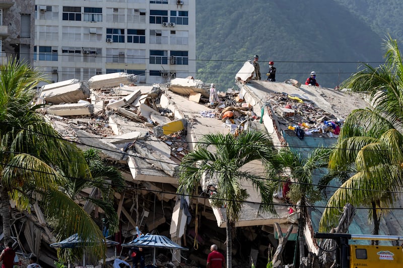A collapsed building in Caraballeda, on the northern coast of Venezuela. Photograph: Miguel Medina/Pool/AFP via Getty Images