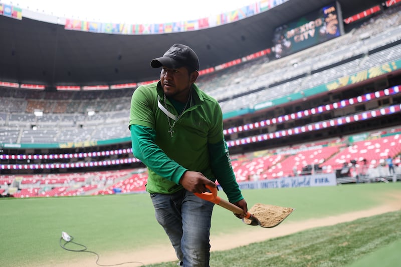 A member of the ground staff at the Azteca stadium in Mexico City on Thursday. Photograph: Carl Recine/Getty Images