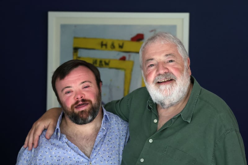 Ivan Martin and his son James speaks to The Irish News.
PICTURES: COLM LENAGHAN