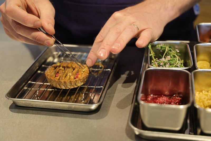 Matt Smith working on baked tomato tart, 'the absolute essence of summer'. Photograph: Bryan O’Brien