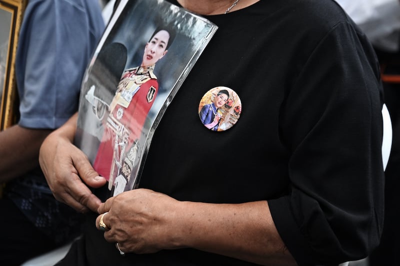 Mourners hold photos of Thai princess Bajrakitiyabha Mahidol inside Chulalongkorn Hospital in Bangkok. Photograph: Lillian Suwanrumpha/AFP/Getty