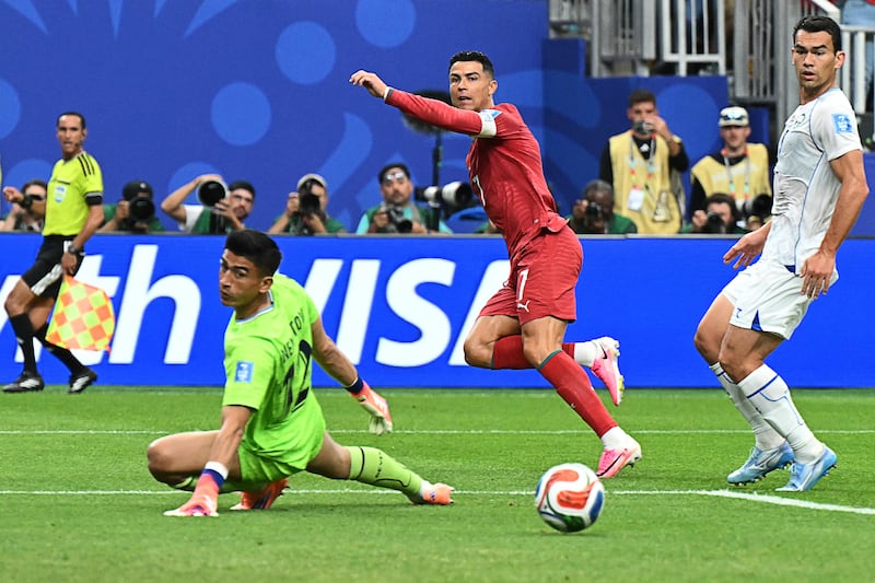 Portugal's forward Cristiano Ronaldo reacts as he scores his team's third goal against Uzbekistan. Photograph: Ronaldo Schemidt/AFP via Getty